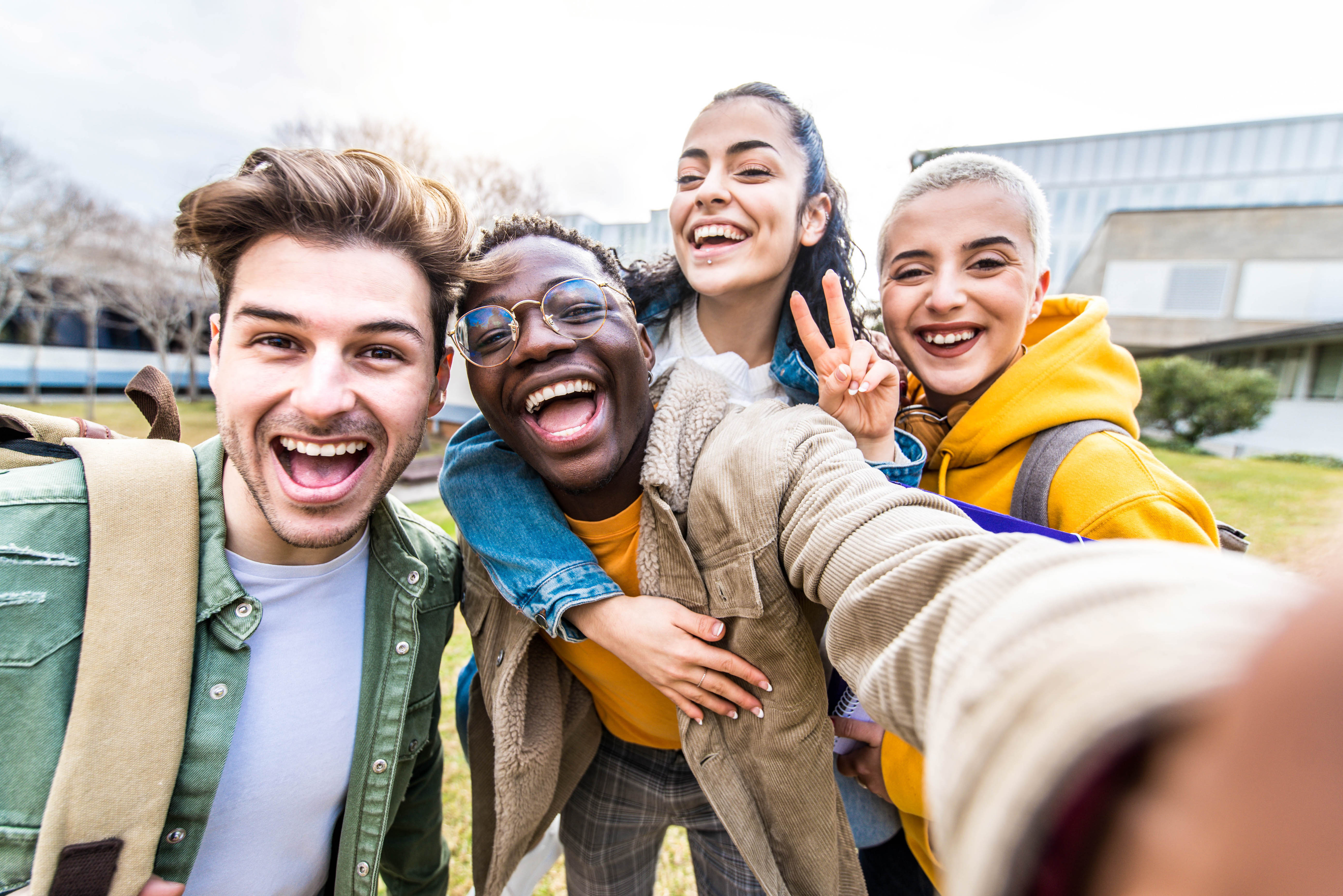 Group of high school students take a selfie outside