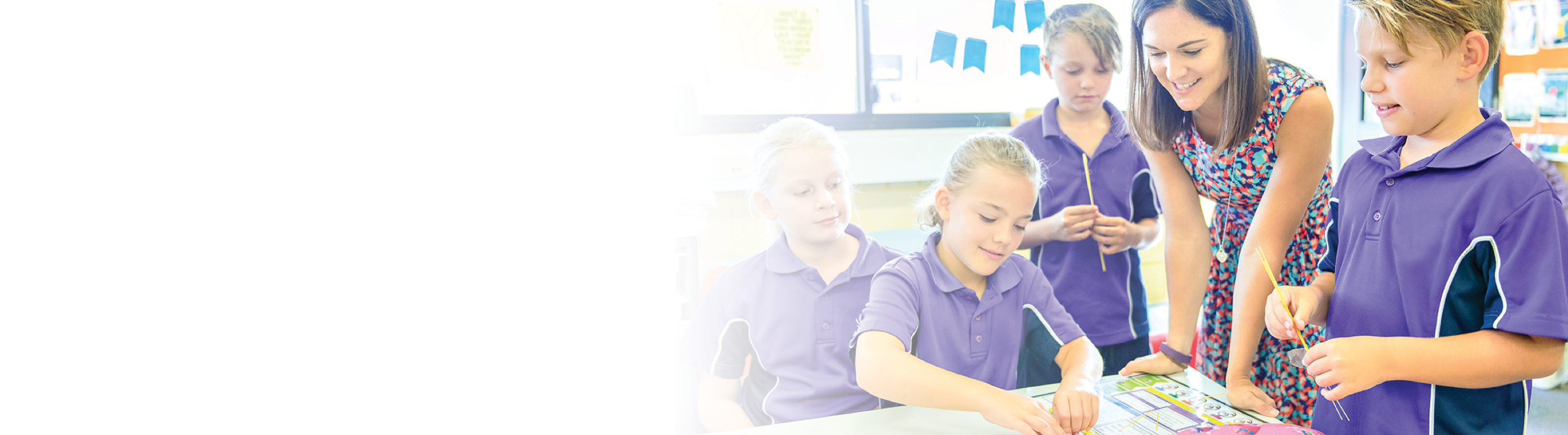 Corwin.com_BANNER_AUS_Home_pg Female teacher surrounded by elementary students
